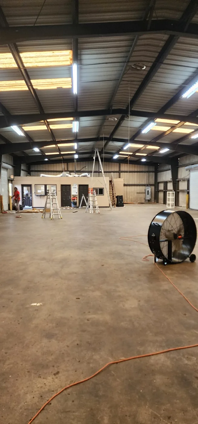Commercial lighting electrical work in a warehouse