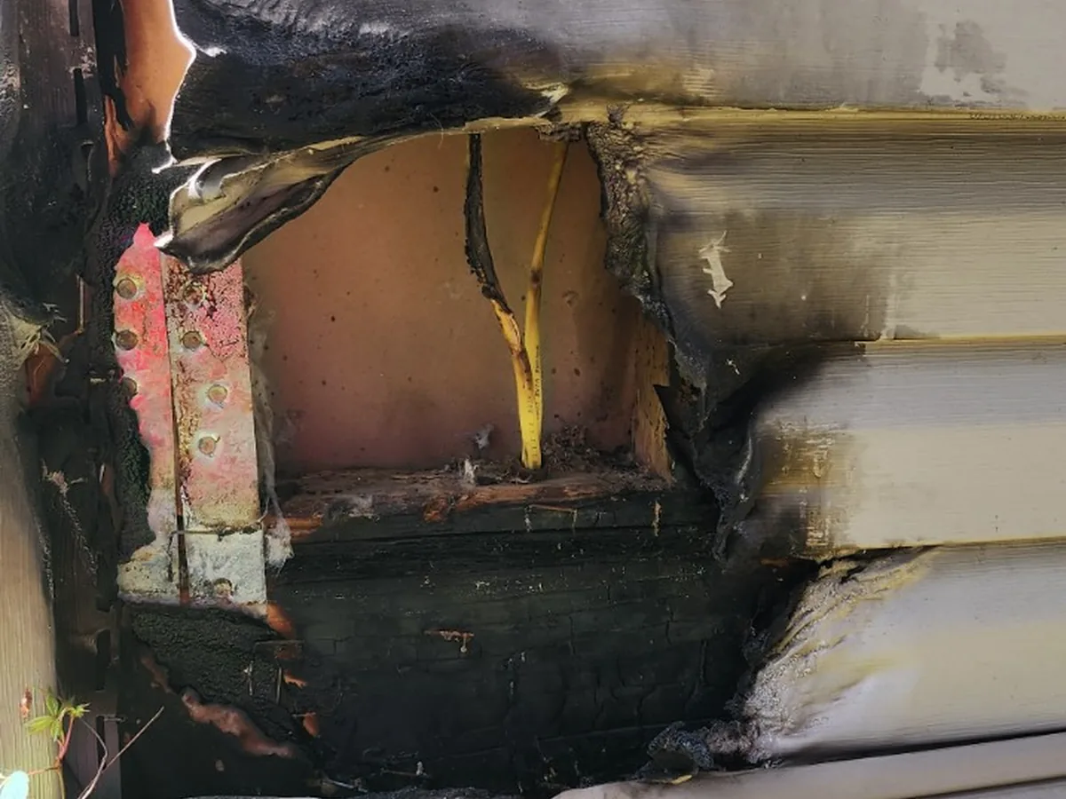 Exterior wall damaged by an electrical fire