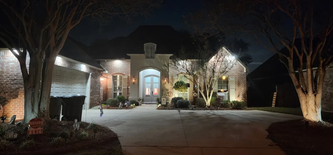 Exterior residential soffit lighting at night